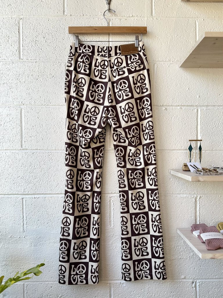 House of Sunny peace print pants