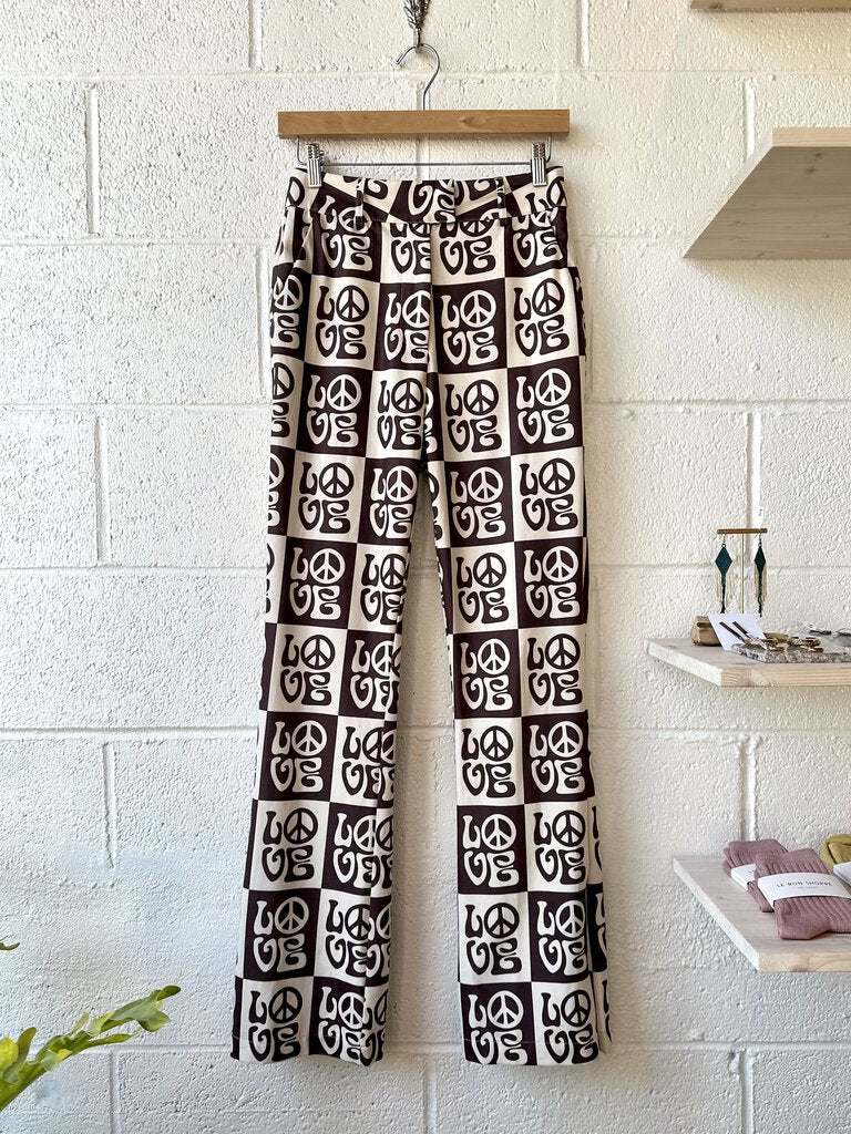 House of Sunny peace print pants